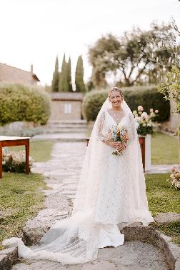 Caroline wearing White Couture by Jodi Moylan